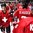 HELSINKI, FINLAND - DECEMBER 26: Switzerland's Noah Rod #26 high fives the bench after scoring Team Switzerland's second goal of the game during preliminary round action at the 2016 IIHF World Junior Championship. (Photo by Matt Zambonin/HHOF-IIHF Images)